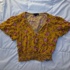 short sleeve crop top with rusching at the bottom